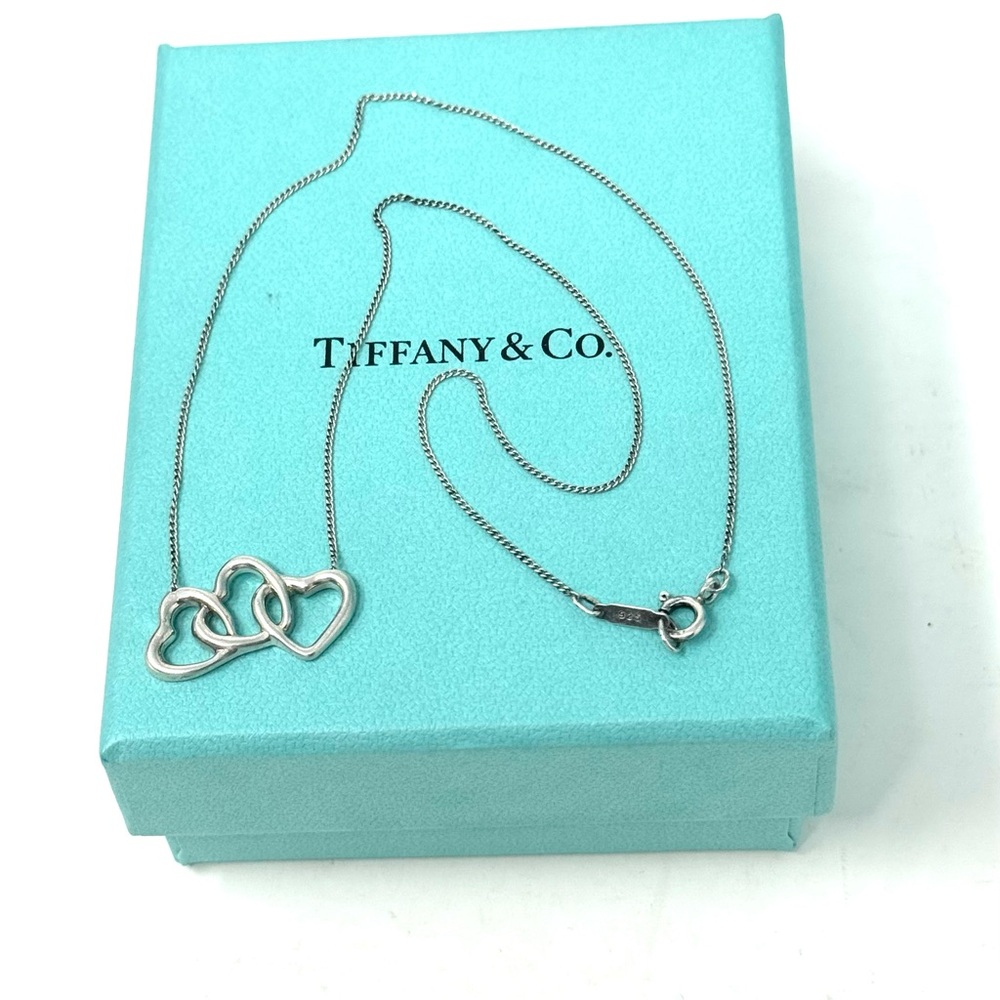 Authentic Tiffany & CO.  Triple open Hearts Pendant Necklace.